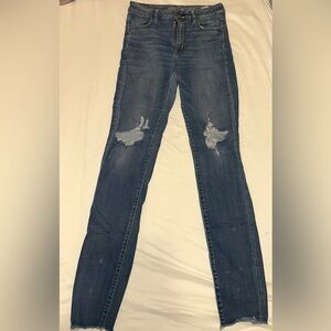 Distressed Blue Jeans